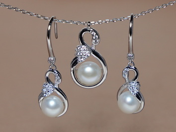 Stříbrný set šperků s motivem labutí a perlami PS555B Stříbrný set šperků s motivem labutí a perlami PS555B